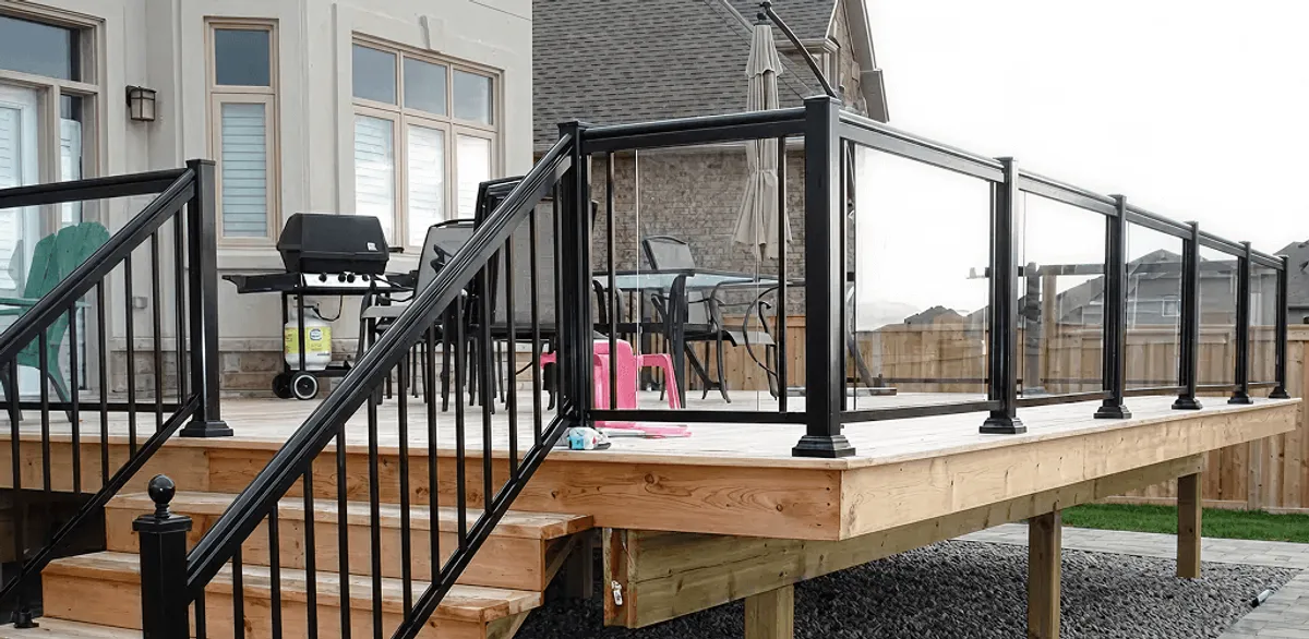Handrail installation on a deck staircase for safety and code compliance in Albany, NY